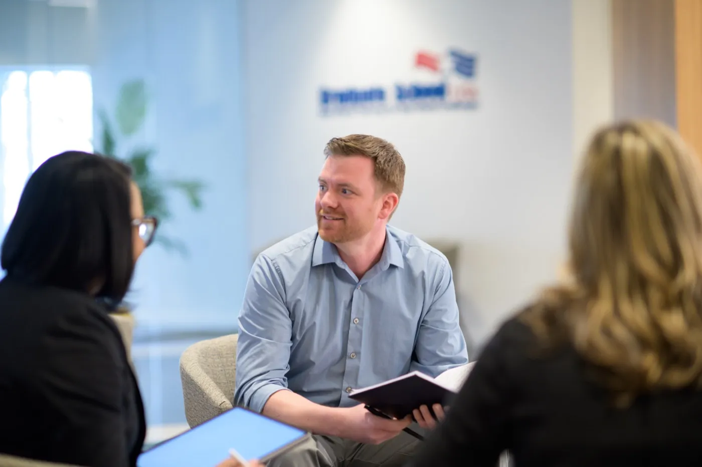 A Graduate School USA advisor meeting one-on-one with an agency client