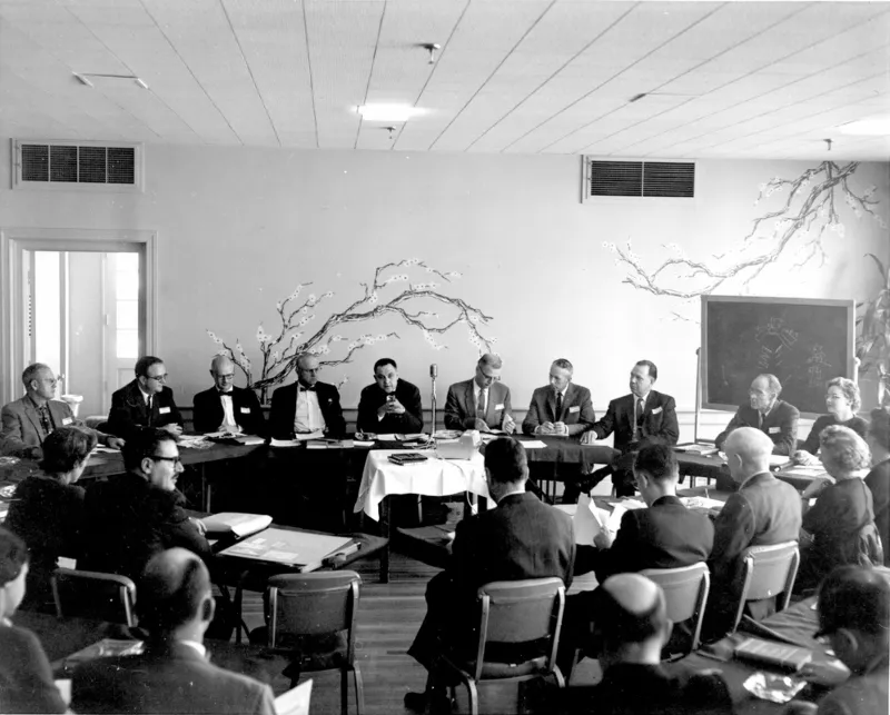 A historical Graduate School USA faculty and leadership gathering, reflecting the institution’s roots as the USDA Graduate School since 1921